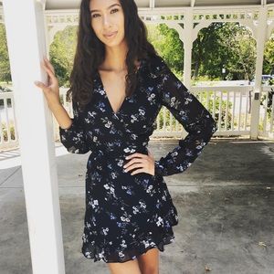 Feminine floral printed wrap dress.